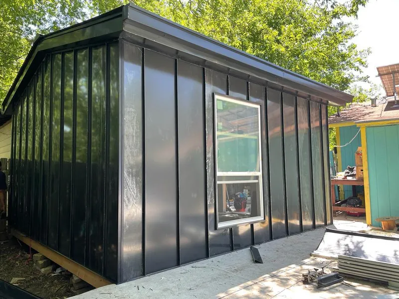 Black standing seam metal wall panels for Metal Roof Installation in Wilton Manors